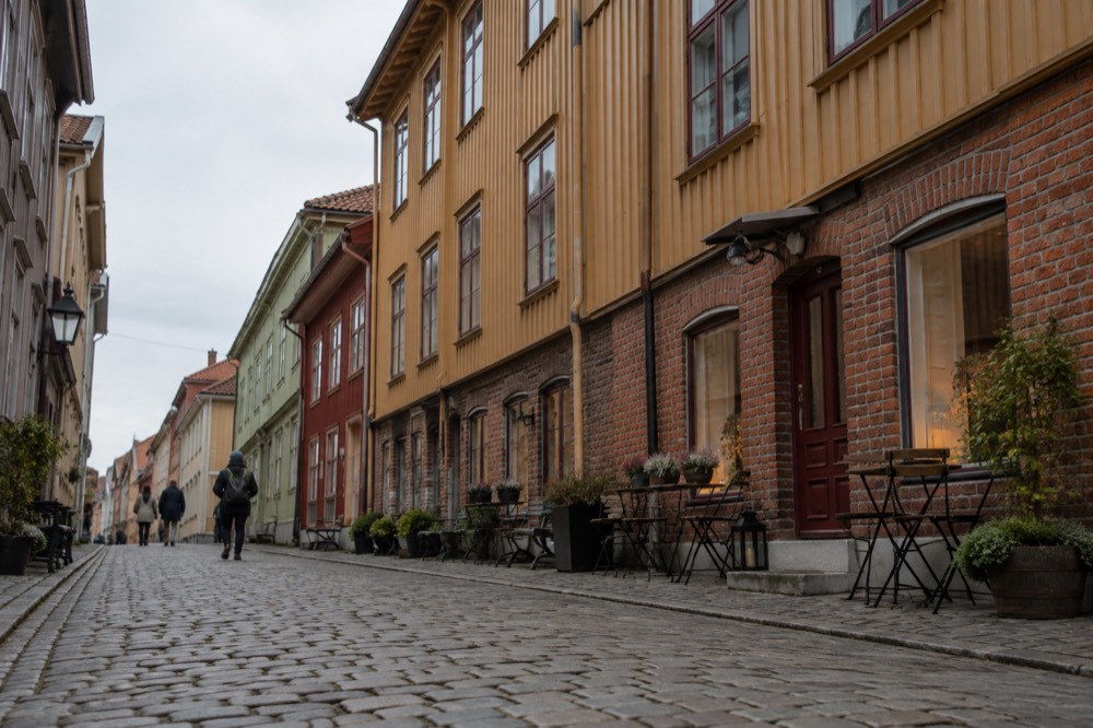 Wooden landshövdingehus facades and a cobbled street in the Haga quarter of Gothenburg