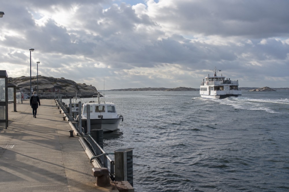 A ferry leaving Saltholmen terminal toward islands on the horizon