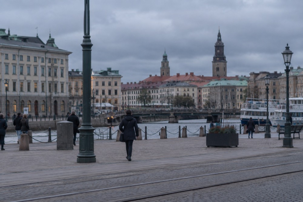 Rain clouds over red rooftops and church towers in central Gothenburg