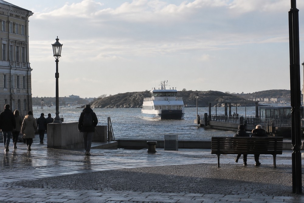 Ferry approaching a small island jetty in the Gothenburg archipelago