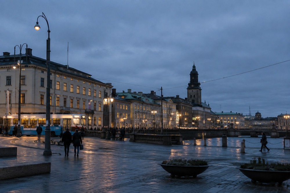 Evening light over rooftops and a church tower in central Gothenburg, Sweden