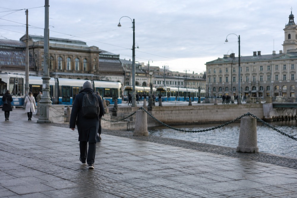Trams passing outside Gothenburg Centralstation on a grey day