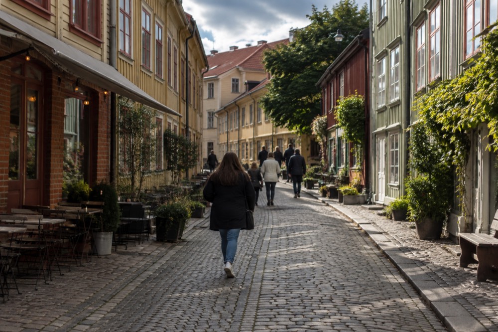 Wooden 19th-century houses on a cobbled street in the Haga quarter of Gothenburg