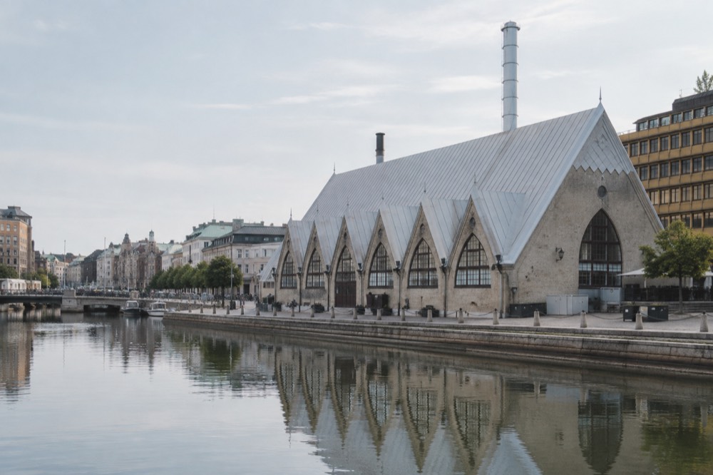 The wooden fish market hall Feskekôrka seen from the canal in central Gothenburg